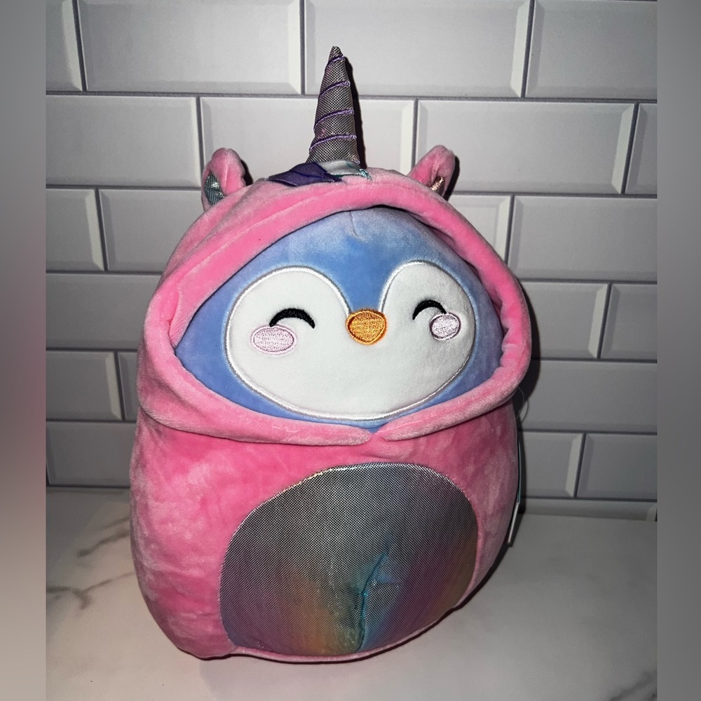 Poxiana the Penguin in a hoodie